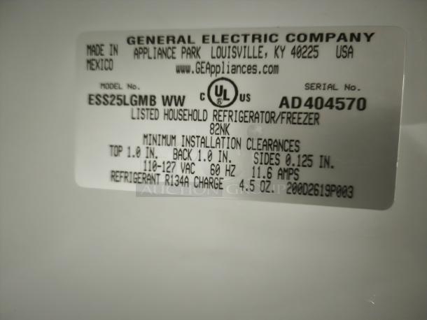 Label on GE Eterna-series refrigerator, model ESS25LGMB, showing serial AD404570, UL listed, R134A refrigerant, made in Mexico.