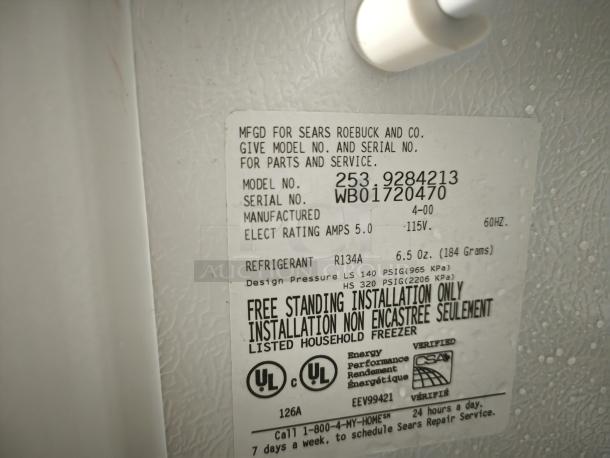 Kenmore 2539284213 Upright Freezer label showing model, serial number, and specifications. Free-standing installation only.