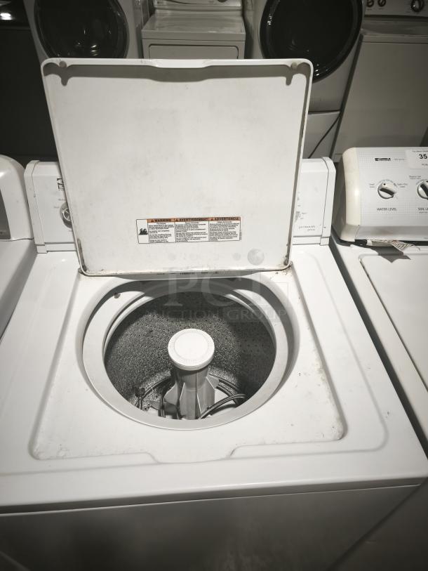 Estate ETW4100SQ3 top-load washer, open lid view, white exterior, visible control panel, used condition.