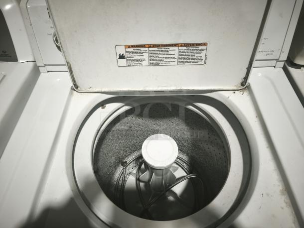 Estate ETW4100SQ3 top-load washer, used condition, visible wear on lid, warning label intact, standard white finish.