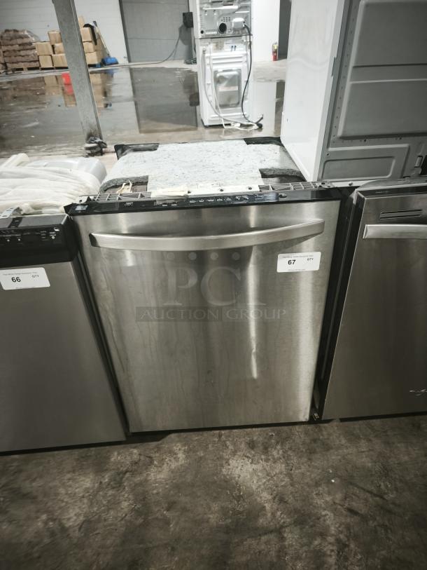 Kenmore Elite 63013913010 Dishwasher; stainless steel, front panel, moderate wear, visible control panel, auction label attached.