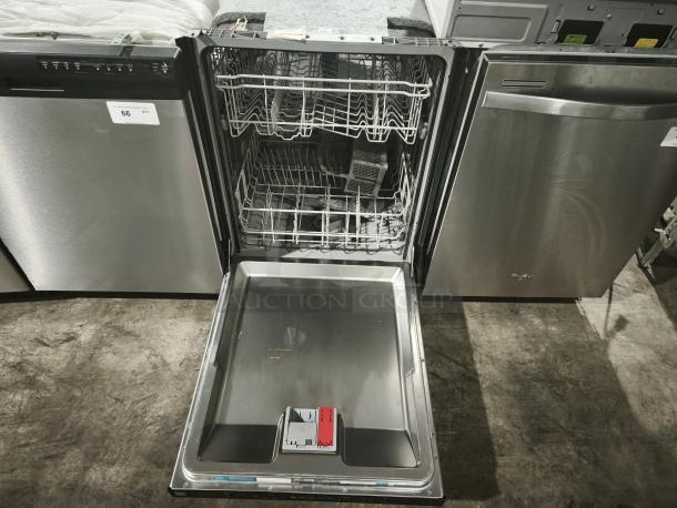 Kenmore Elite 63013913010 dishwasher, stainless steel finish, open door showing racks, auction tag visible.