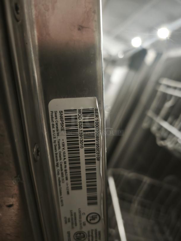 Kenmore Elite 63013913010 Dishwasher label showing model number, serial number, and manufacturing details.