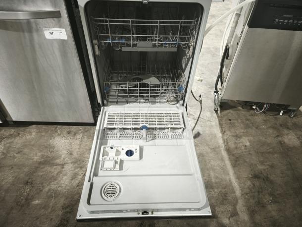 Whirlpool Gold 24" built-in dishwasher, model WDT720PADM2, tall tub design, stainless finish, open to show interior.