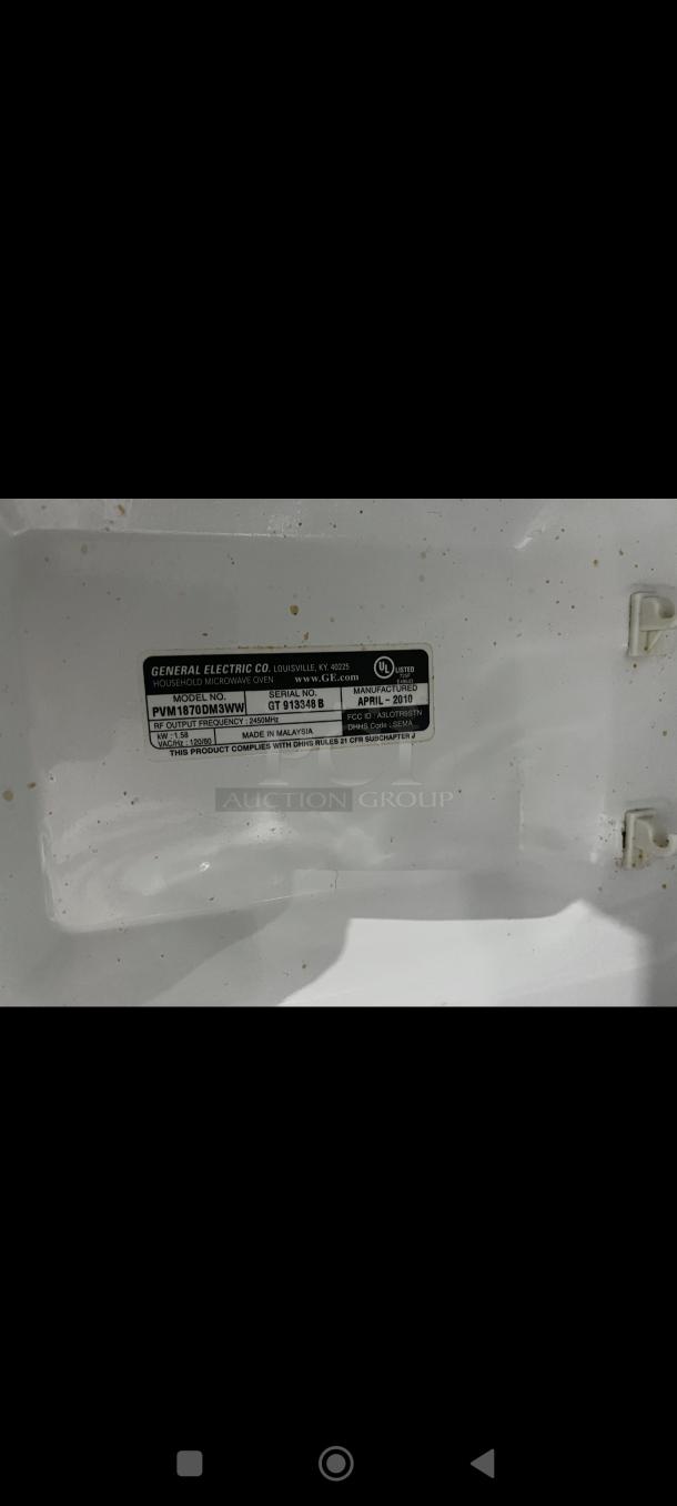 GE Profile Spacemaker 1.8 Cu. Ft. XL1800 Microwave, model PVM1870DM3WW, serial GT913348B, manufactured April 2010.