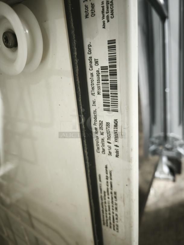Frigidaire Full Console Dishwasher, Model FFBF2411NW0A, with visible product label and model details.