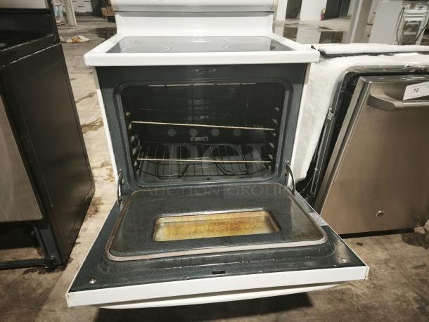Hotpoint 30" electric range model RB787W H2WW, free-standing, open oven door, visible wear, interior racks.