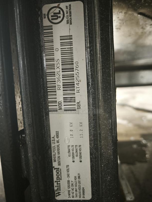 Label on Whirlpool 30" Self-Cleaning Freestanding Electric Range, Model RF362LXSS, showing model and serial numbers.