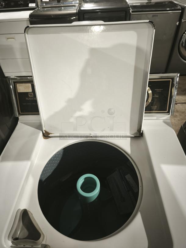Maytag A511 top-load washer, white, open lid showing drum, slight rust on lid hinge, visible control panel.