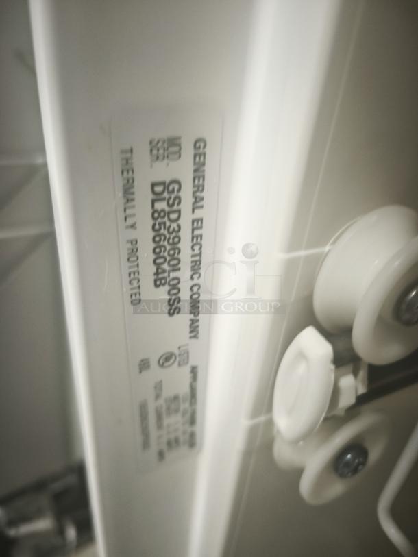 GE Built-In Full-Console Dishwasher, Model GSD3960L00SS, features durable construction. Serial tag indicates thermal protection.