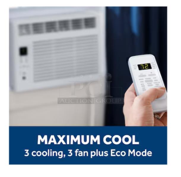 GE 6,000 BTU window air conditioner for 250 sq ft rooms, shown with remote control. Model AHQ06LYC. Features cooling and Eco Mode.