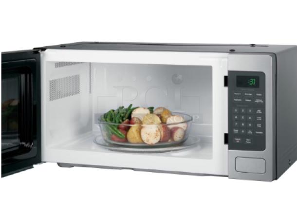 GE Profile 1.1 Cu. Ft. Countertop Microwave, Stainless Steel, Model PEM31SFSS, with digital display and control panel.