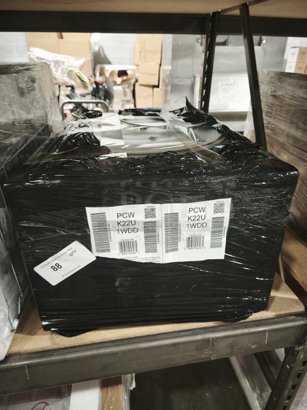 GE Profile PCWK22U1WDD 2.2 cu. ft. Built-In Sensor Microwave Oven in gray, new condition, boxed with labels.