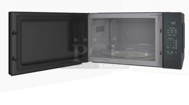 GE Profile™ 2.2 Cu. Ft. Built-In Sensor Microwave Oven, model PCWK22U1WBB, with open door showing interior.