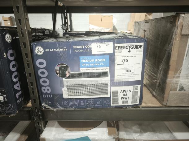 GE 8,000 BTU Smart Window AC, Model AWFS08WWL, for 350 sq. ft. rooms, energy guide label shows $70/year cost. New in box.
