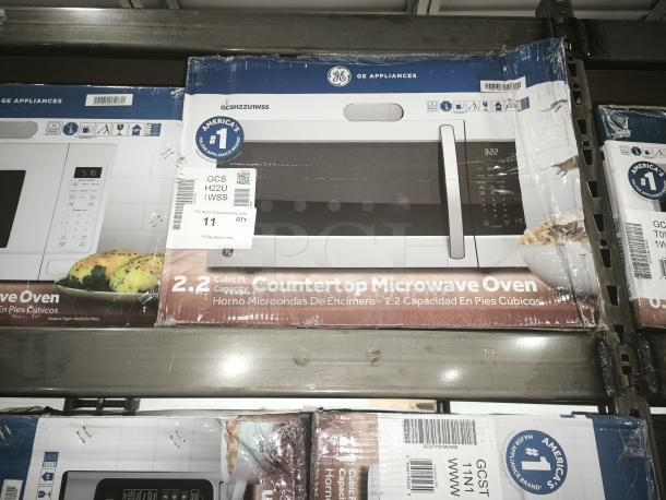 GE® 2.2 Cu. Ft. Countertop Microwave Oven, model GCSH22U1WSS, in box. Features easy-to-use controls and spacious interior.
