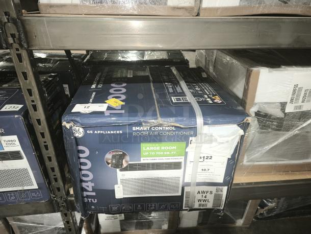 BRAND NEW GE 14,000 BTU Smart Window AC, model AWFS14WWL, for rooms up to 700 sq. ft., boxed with scratches and dents.