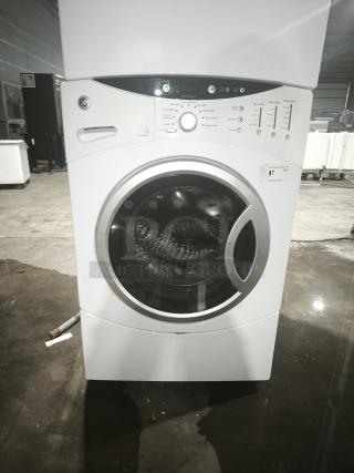 GE® 3.7 Cu. Ft. Frontload Washer, Model WCVH6260HWW, features stainless steel drum, visible control panel, good condition.
