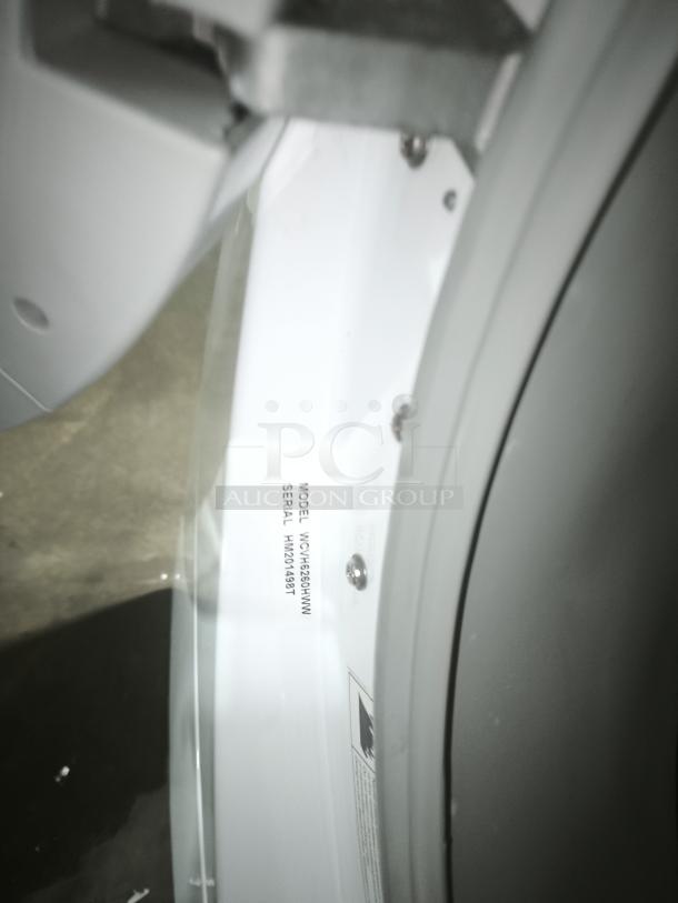 GE® ENERGY STAR® 3.7 Cu. Ft. Frontload Washer, Model WCVH6260HWW, visible label showing model and serial number.