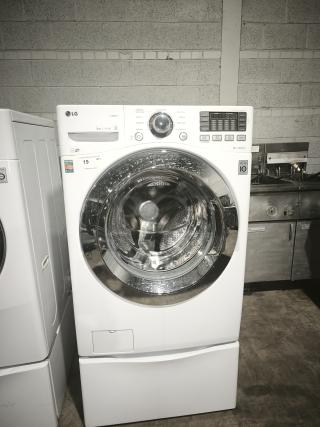 LG 4.3 cu. ft. Ultra-Large Capacity Steam Front-Load Washer, Model WM3370HWA, in excellent condition. Features clear control panel.