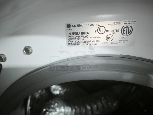 LG Steam Washer™ 3.6 cu. ft. Extra-Large Front-Load Washer, Model WM2650HWA. UL, ETL, NSF certified label visible.