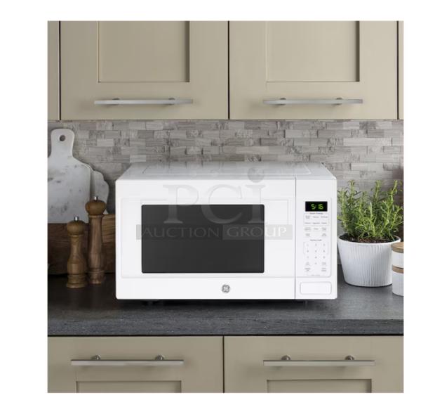 Brand new GE 1.6 Cu. Ft. countertop microwave (Model GCST16S1WWW), white finish. Scratch and dent condition.