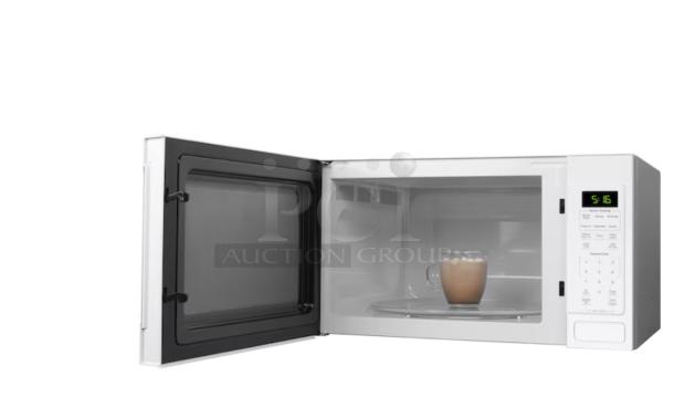 BRAND NEW GE® 1.6 Cu. Ft. Countertop Microwave (Model GCST16S1WWW), open door showing interior with hot beverage. Scratch and dent condition.