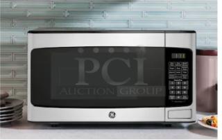 BRAND NEW SCRATCH AND DENT  GE® 1.1 Cu. Ft. White Countertop Microwave Oven (Model GCST11N1WWW) - Item #1209976