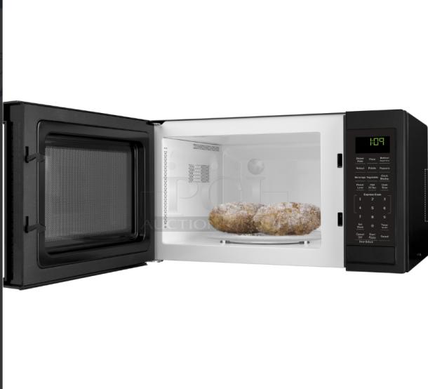 BRAND NEW GE 0.9 Cu. Ft. Countertop Microwave (Model GCST09N1WBB), black finish, scratch and dent, open door, digital display.