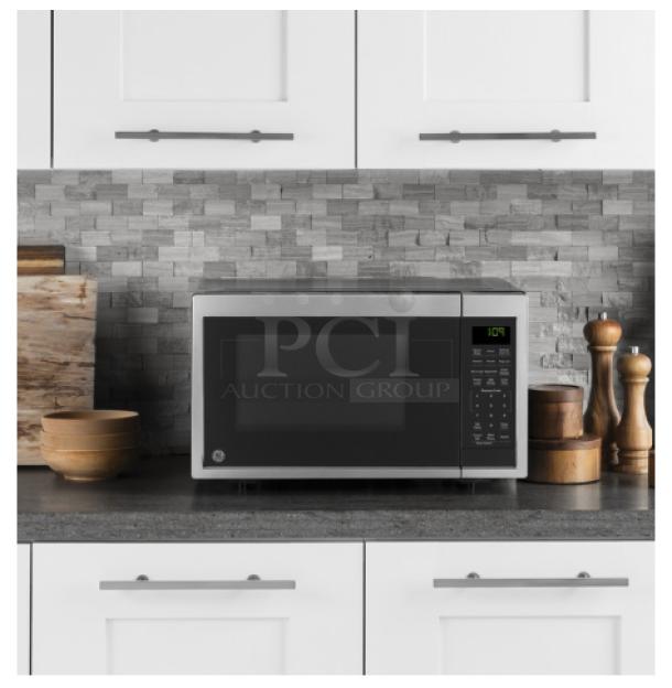 GE® 0.9 Cu. Ft. Countertop Microwave Oven, Model GCST09N1WSS, stainless steel finish, digital display, keypad controls.