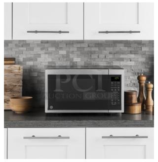 GE® 0.9 Cu. Ft. Countertop Microwave Oven, Model GCST09N1WSS, stainless steel finish, digital display, keypad controls.