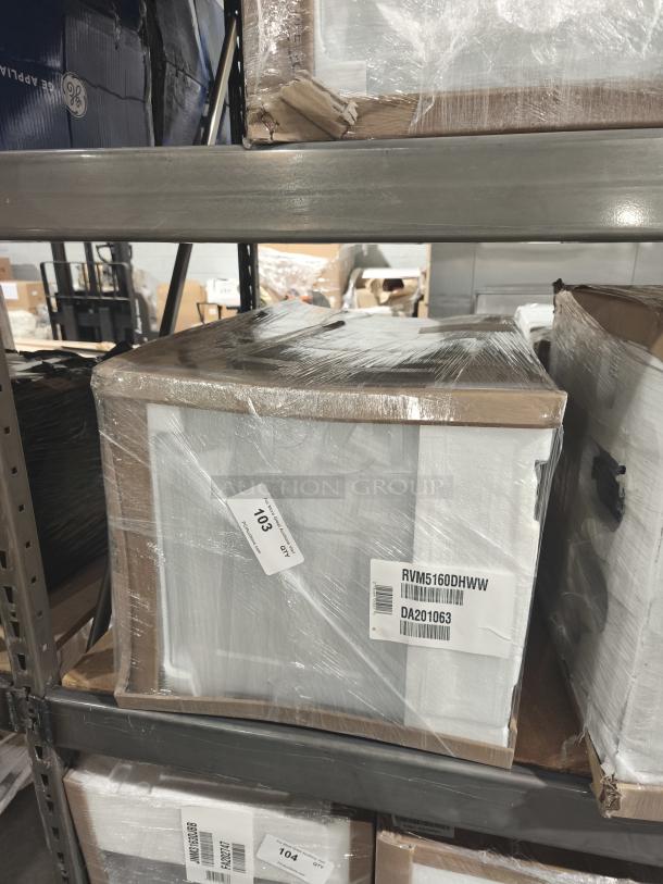 Hotpoint RVM5160DHWW 1.6 cu. ft. over-the-range microwave, white, wrapped on a shelf. Model and barcode labels visible.