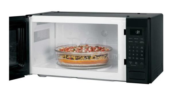 BRAND NEW GE Profile Microwave Oven, Model PCHK11S1WBB, 1.1 Cu. Ft., Black, visible control panel, minor scratches.