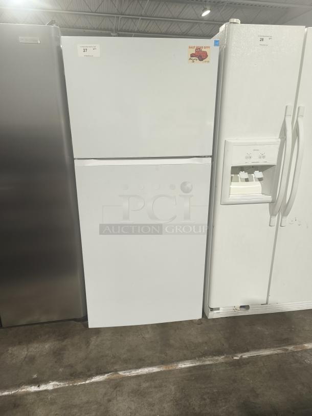 Criterion® fridge, model 453-8090, white, top-freezer design, excellent condition, visible sticker and auction tag.