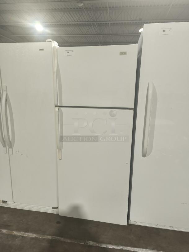 Roper RT18BKXKQ00 refrigerator/freezer, white, top-freezer design, visible handles, moderate wear, auction item number 29.