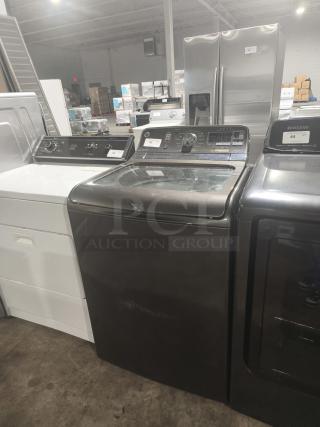 GE® 5.0 cu. ft. washer, model GTWS8655D0MC, stainless steel basket, steam feature, gently used condition.