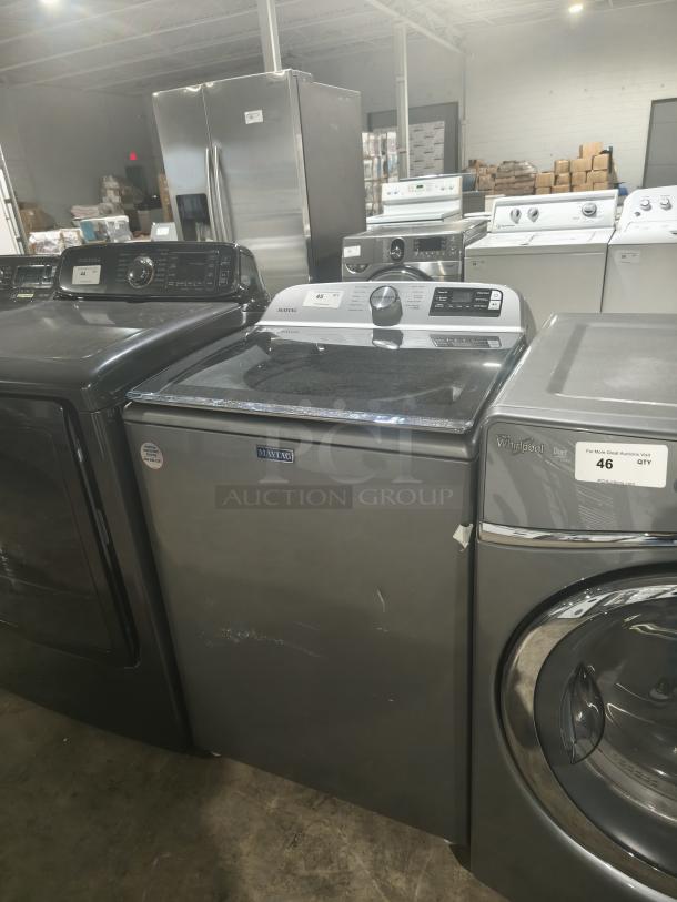 Maytag 27" 5.4 Cu. Ft. Smart Top Load Washer MVW6230HC2, gray, extra power button, slight wear, visible label.