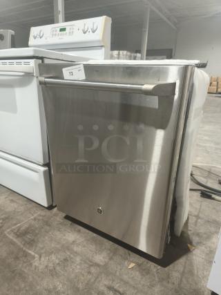GE Café™ Series stainless interior built-in dishwasher, Model CDT765SF7SS. Modern design, stainless finish, slight wear.