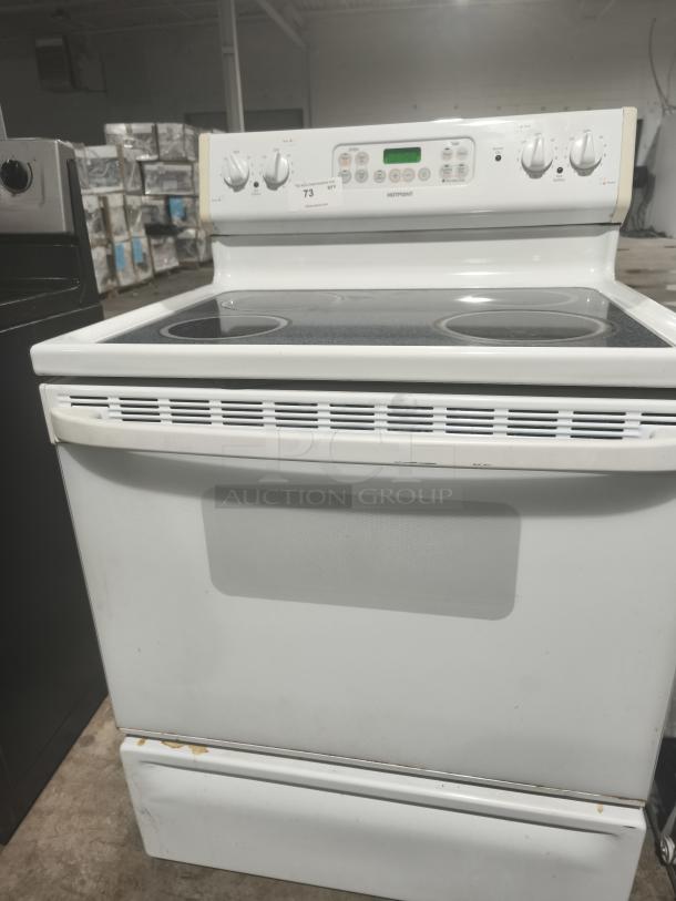 Hotpoint 30" free-standing electric range, model RB787W H2WW, white, used condition with visible wear, control panel, and dials.