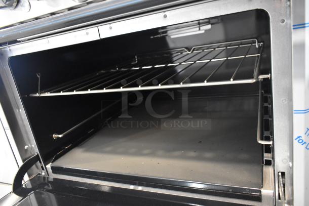 Brand new 2021 Southbend 4601DD stainless steel commercial 10 burner gas range with two ovens and backsplash.