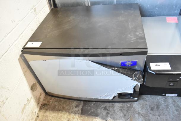 Manitowoc IDT0450A-161 stainless steel ice machine, brand new, 470 lb capacity. Minor scratch and dent damage visible.