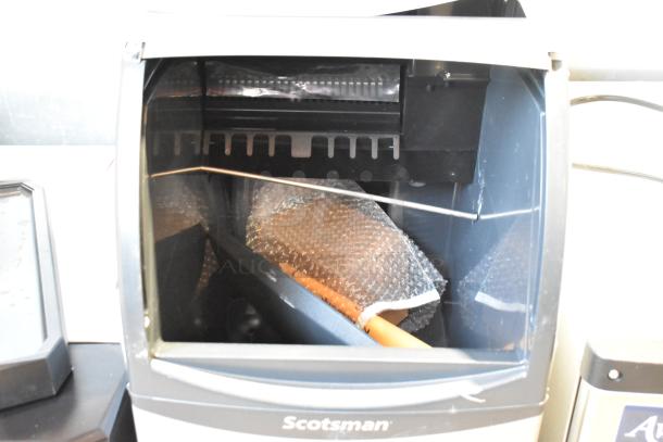 Brand new 2023 Scotsman CU0415MA-1A stainless steel undercounter ice machine, 58 lb, 115V, 1 Phase, with minor scratches.