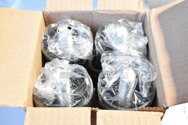 Boxed components of the 2023 Scotsman CU0415MA-1A Ice Machine, covered in protective plastic.