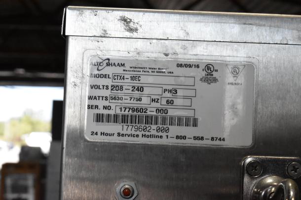 Alto Shaam CTX4-10EC combi oven label, showing model, volts, watts, serial number, and UL certification on stainless steel.