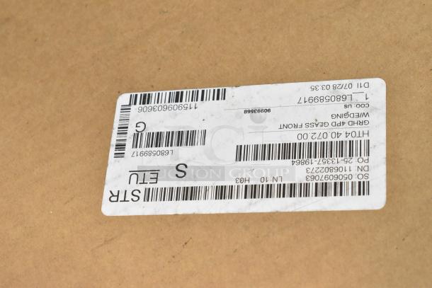 Shipping label on a cardboard box for Hatco GRHD-4PD stainless steel countertop heated display case. Brand new condition.