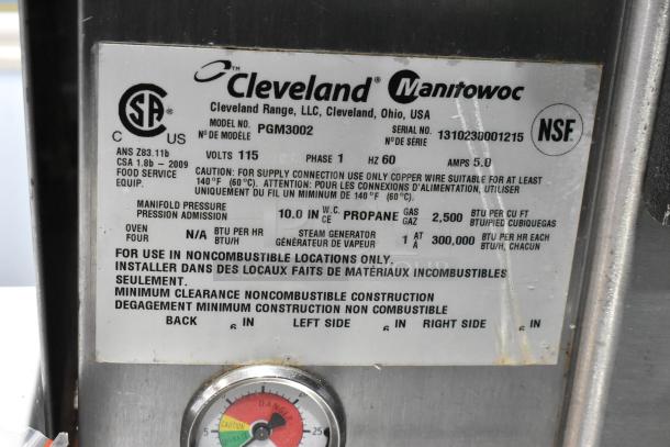 Cleveland PGM3002 Stainless Steel Commercial 2 Deck Pressure Steam Cabinet label detailing voltage, gas type, and safety guidelines.