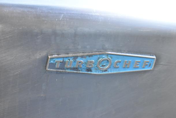 Turbochef logo on stainless steel finish of 2017 HhC2020 commercial electric rapid cook conveyor oven.