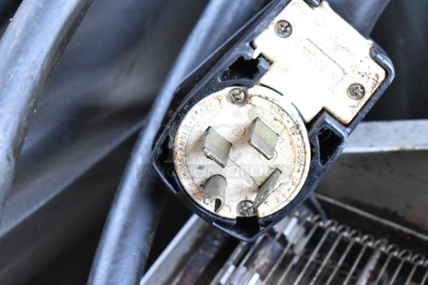 Close-up of a plug for a Turbochef HhC2020 conveyor oven. Shows the 3-phase power connection.