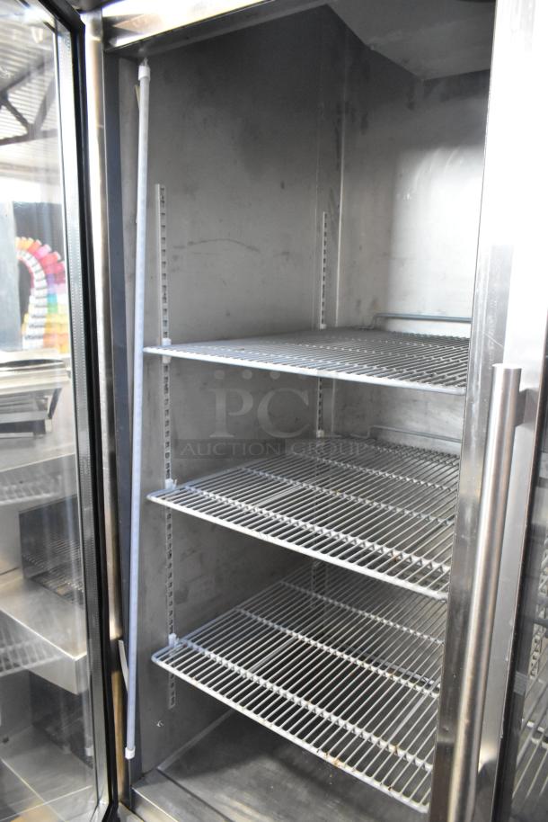 Arctic Air stainless steel 2-door reach-in cooler merchandiser, poly coated racks, 115 volts, 1 phase, commercial use.