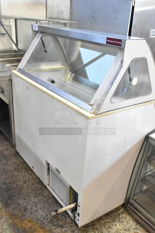 Kelvinator metal commercial ice cream dipping cabinet, glass top, white, used condition, visible signage "Please close after scooping."